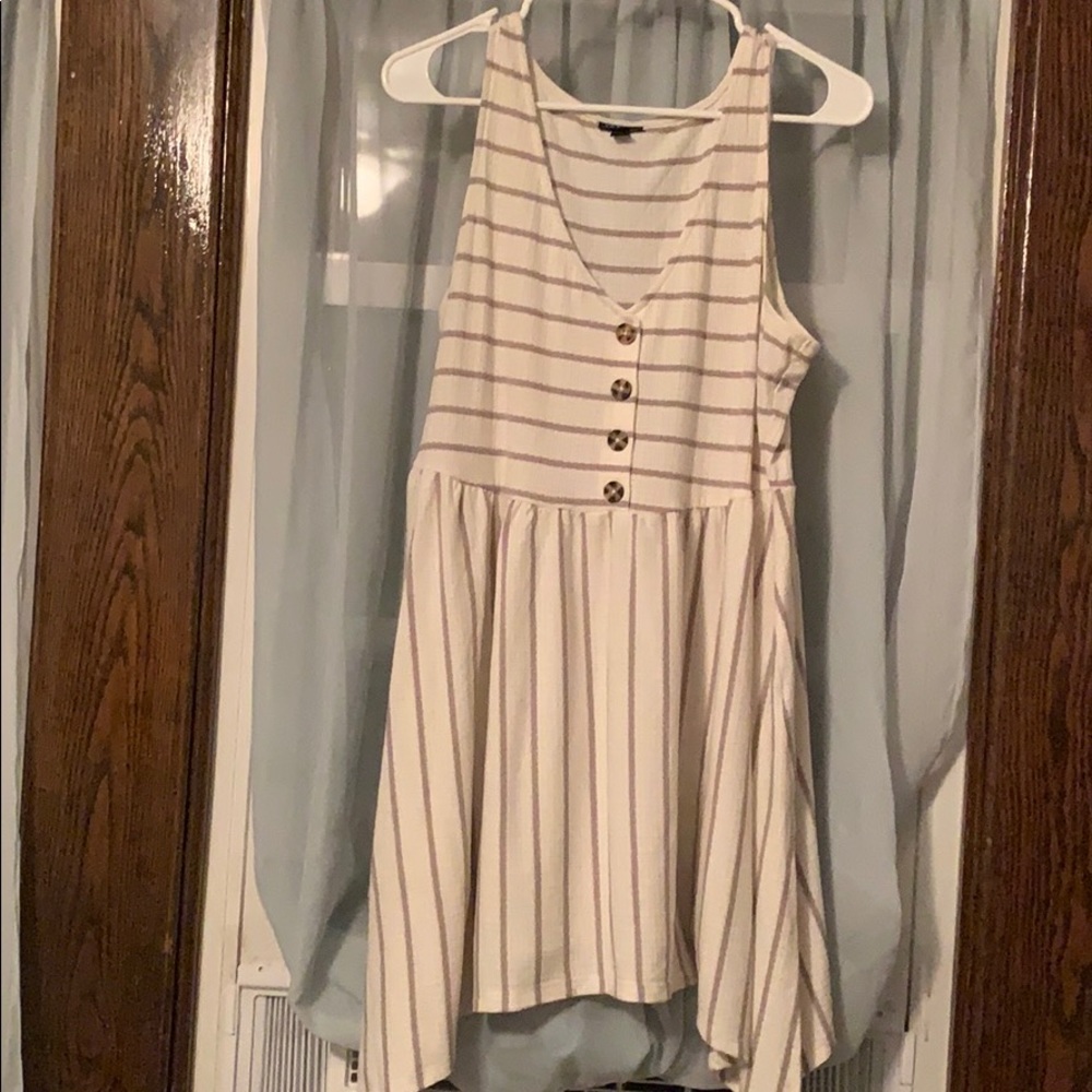 Shark bite hem sleeveless top